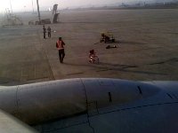 04-03-07_0755 Rogue wheel chair on the tarmac at the airport in Delhi