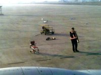 04-03-07_0756 Rogue wheel chair on the tarmac at the airport in Delhi