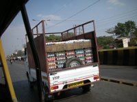 DSCN0251 A ride in a motorized rickshaw in Pune - Egg delivery
